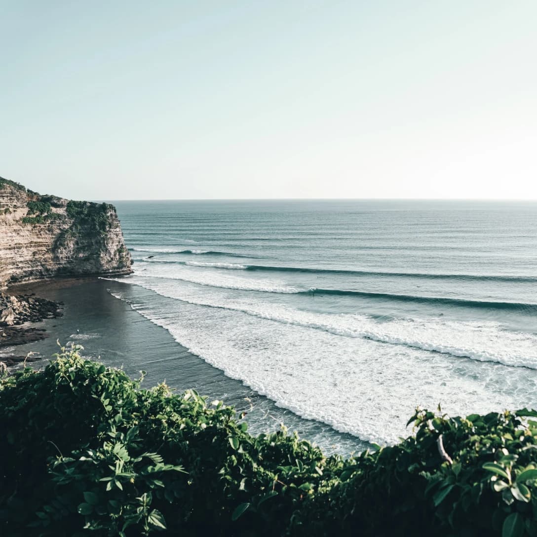 Clifs, ocean and waves in Uluwatu, Bali.